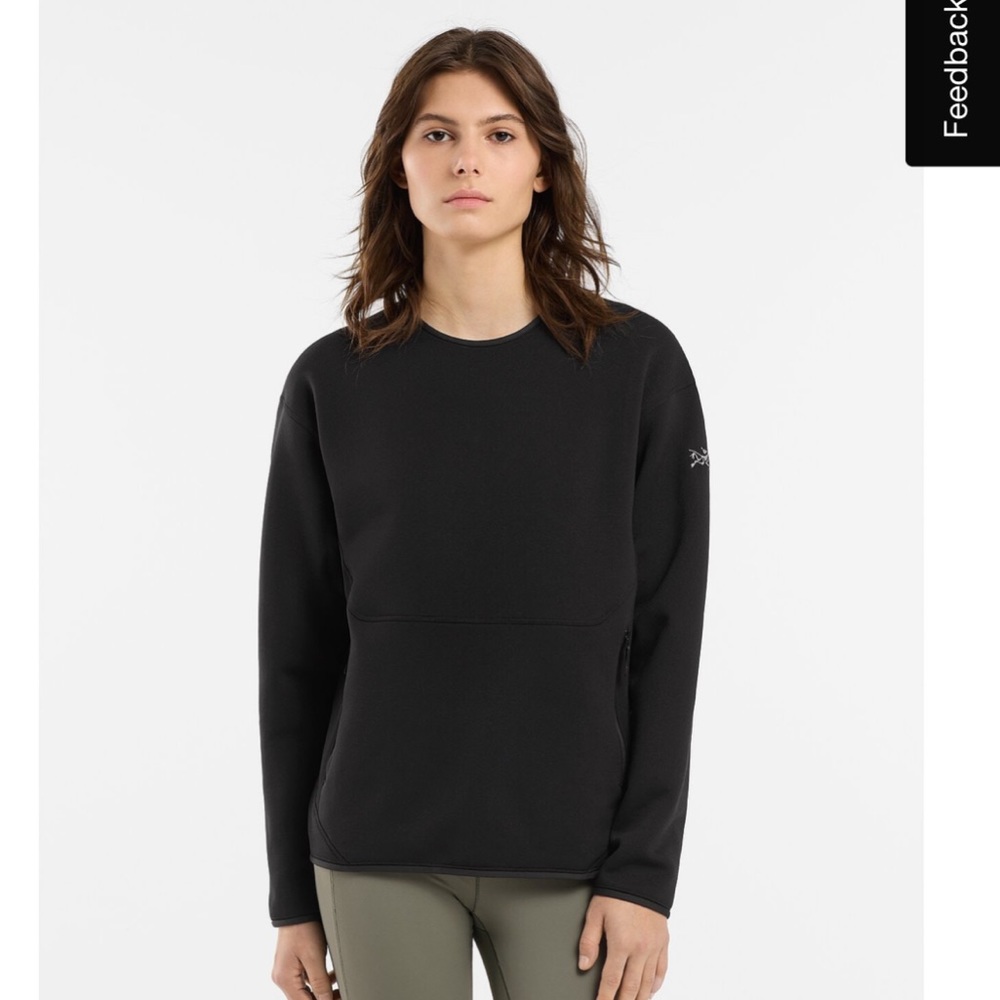 Arc’teryx Kynalite pullover. Super cozy fleece lined inside. Two front pockets.